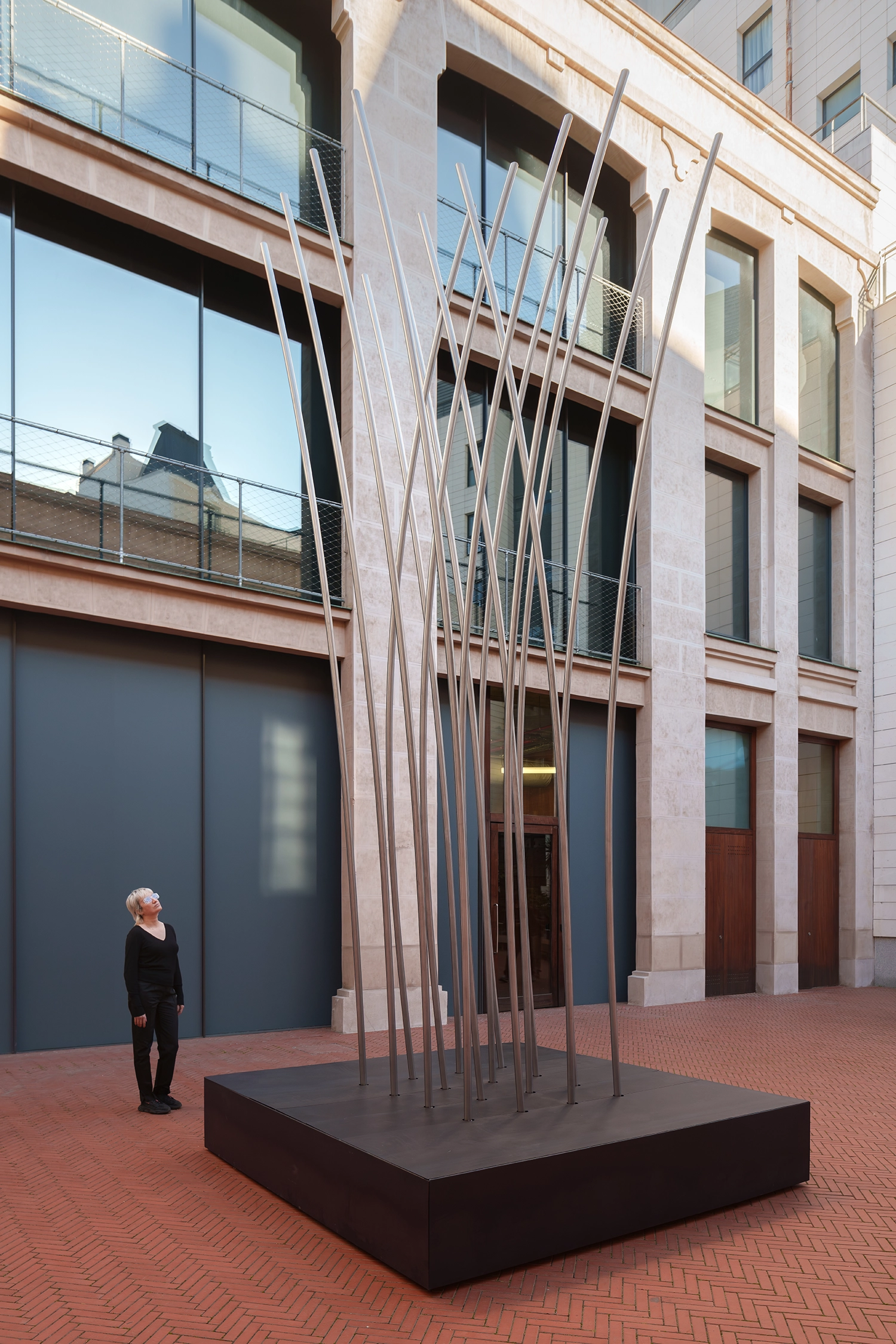 Slats of DISLOCATION by SpY fanning out in a chaotic yet mathematical arrangement.
