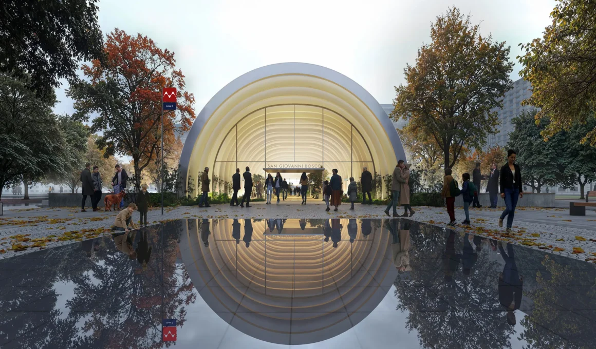 A luminous arched entrance to the San Giovanni Bosco station set within a park during autumn.