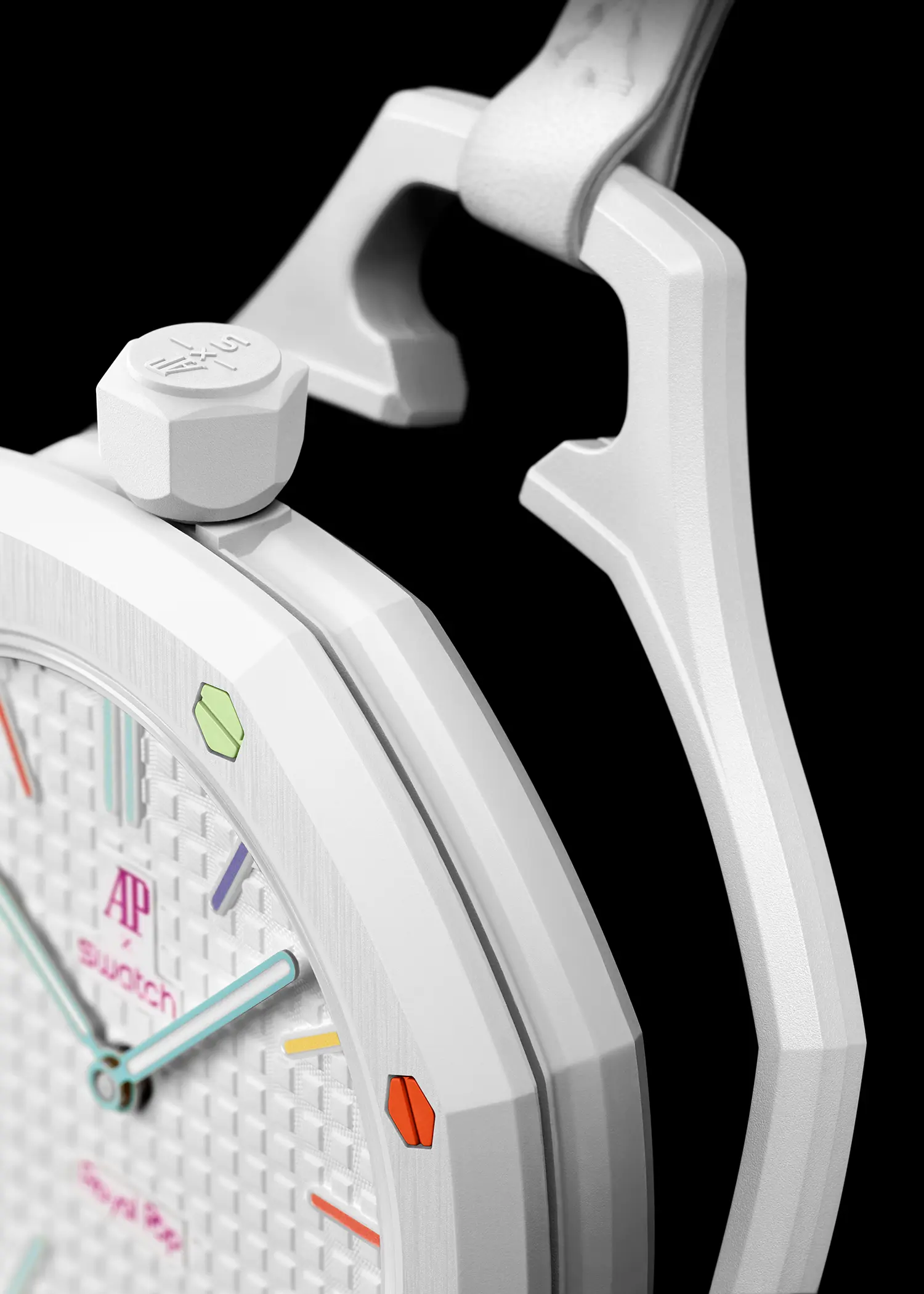 Profile view of a white Bioceramic watch case showing the multi-colored bezel screws.