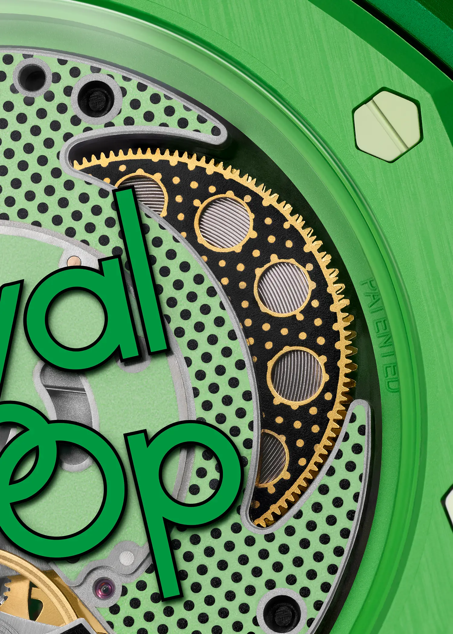 Macro of green Bioceramic caseback with "Patented" engraving and visible golden gears.