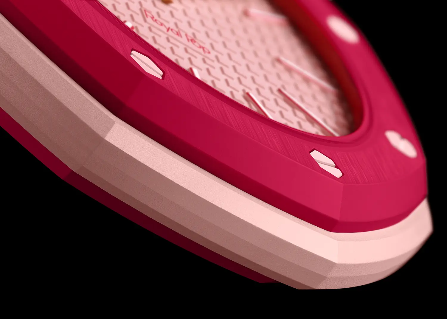 Extreme close-up of a pink and magenta Bioceramic octagonal bezel.