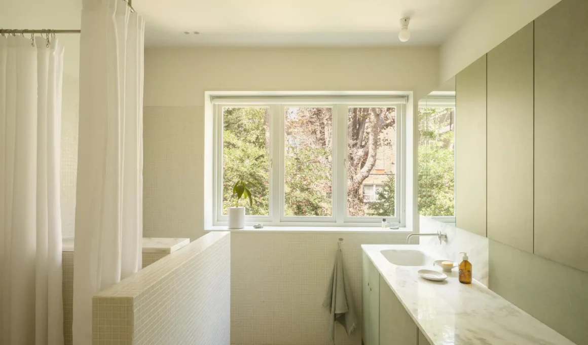 Sage green joinery and white mosaic tile bathroom, Elmhurst house London, O'Sullivan Skoufoglou Architects