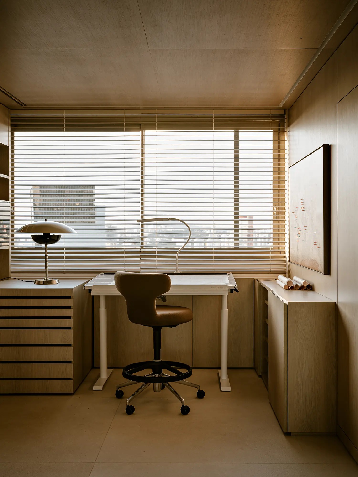 Architect's home studio with drafting table, venetian blinds, plywood storage and rolled drawings, AC Apartment São Paulo, Arthur Casas
