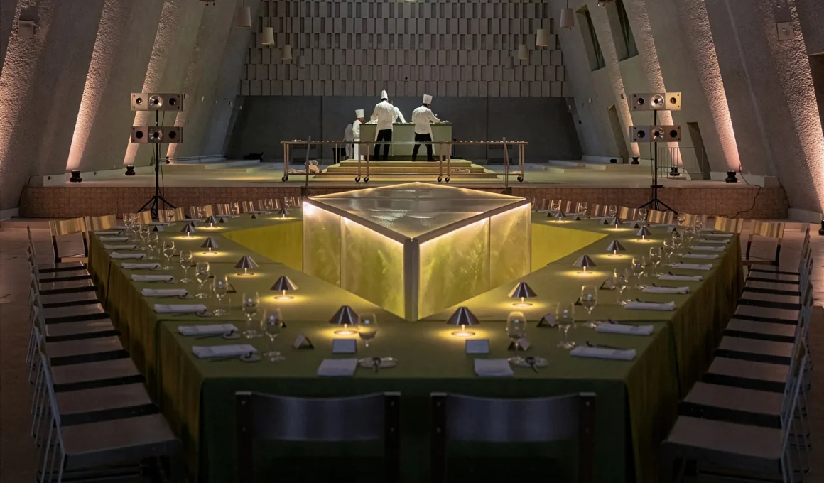 Menu Extra Efflorescence Montreal Franciscans Chapel, diamond communal table green fabric, boreal microbiome glass box, chefs at altar, Brutalist concrete nave