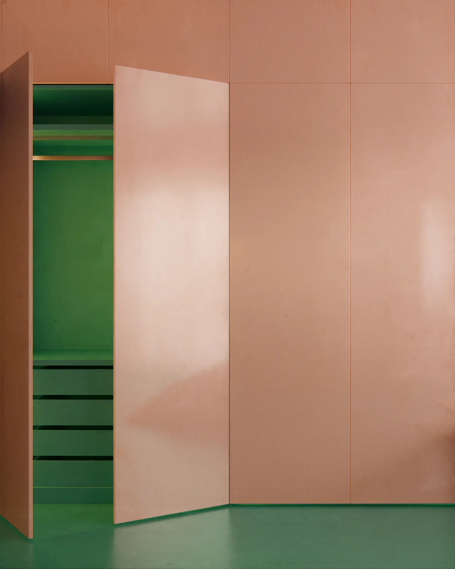 Flush pink wardrobe door opened to reveal a bright green interior shelving unit over green flooring.