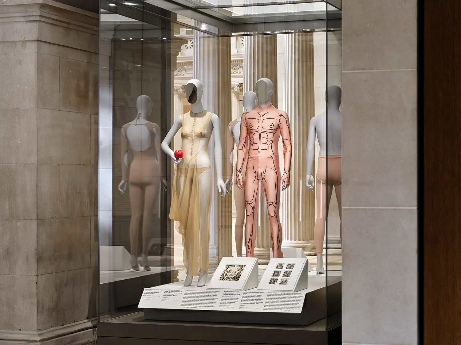 Modern exhibition store inside a museum featuring minimalist custom white oak shelving and clean architectural detailing.