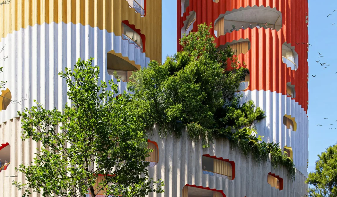 Close-up of the corrugated concrete façade of Sky-K towers with circular openings and integrated greenery.