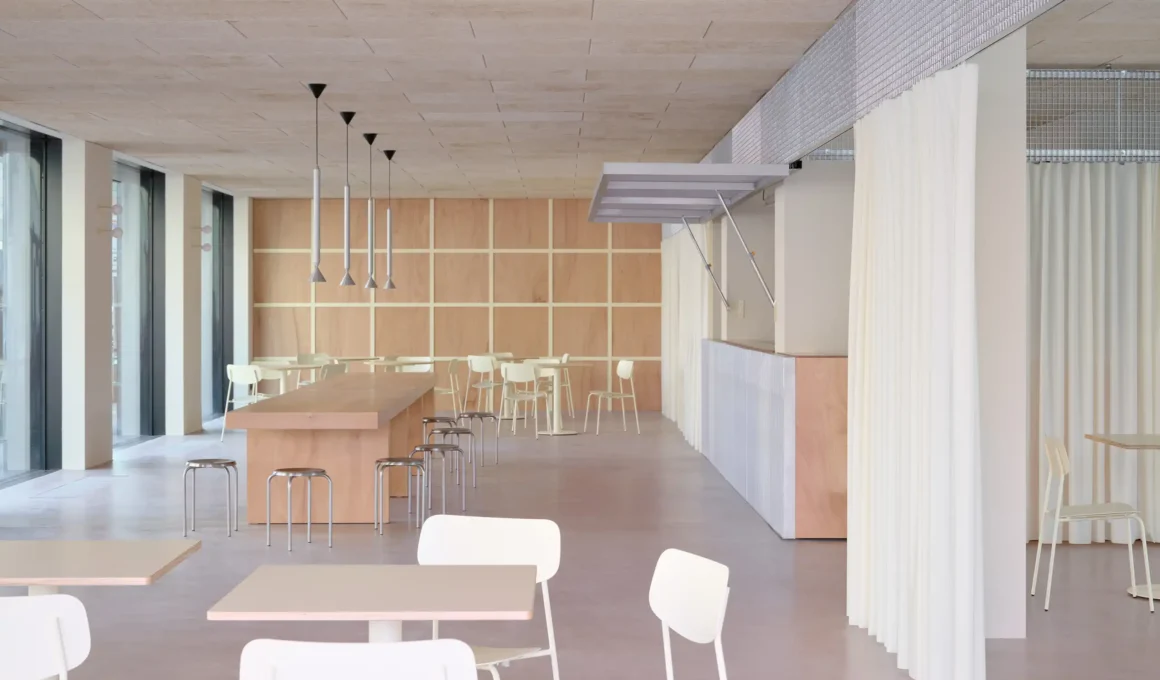 WAO Kitchen Milan by Studio WOK, pink concrete floor, opaline fabric curtains, Okoumé wood wall, Celenit ceiling panels