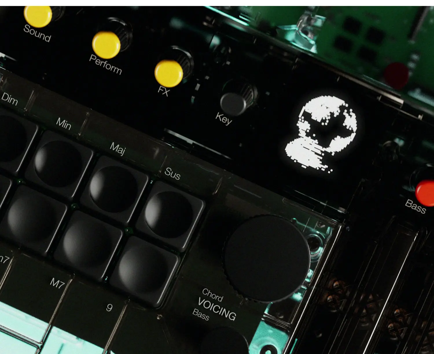 Macro shot of the chord voicing pads and control knobs on the transparent Arctic synthesizer.