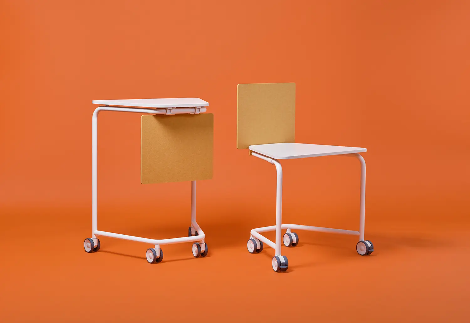 Two Scout Sprint mobile tables in white, one with a yellow privacy panel attached.