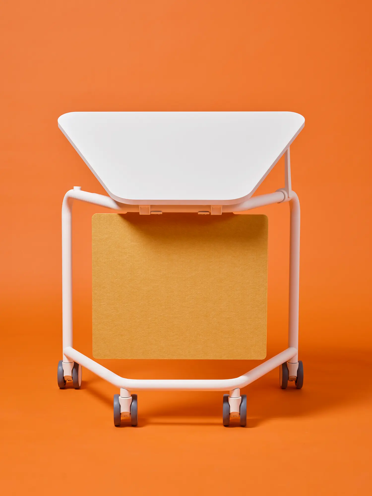 Rear view of a Scout Sprint mobile table with a white trapezoidal top and yellow lower panel.