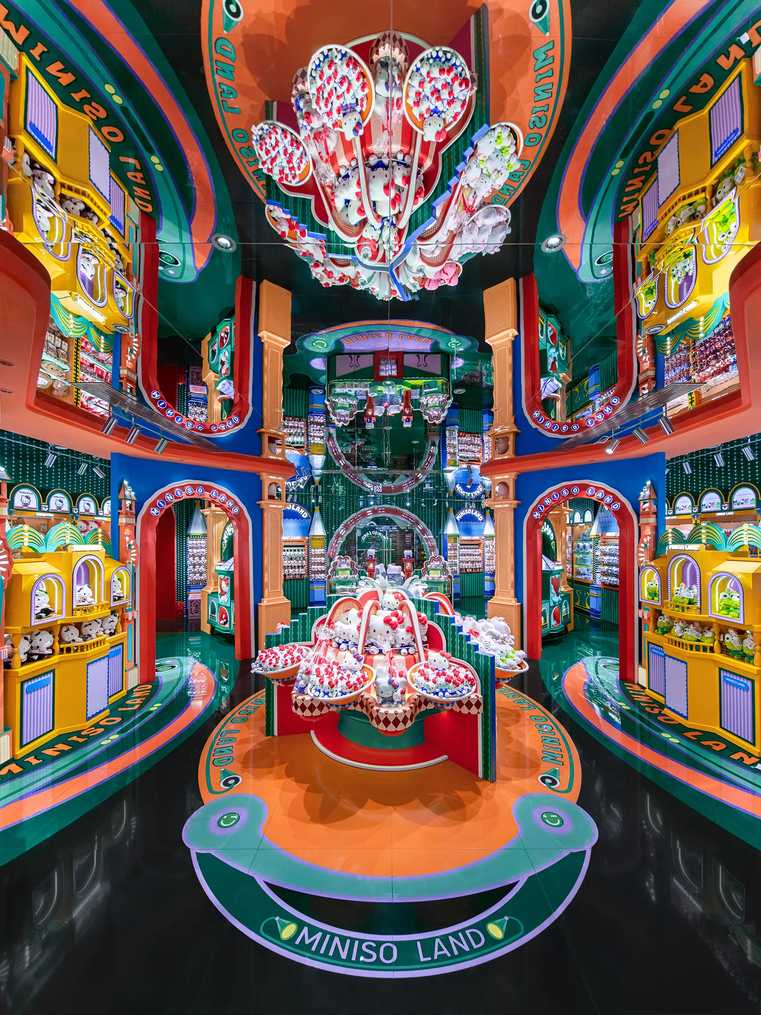 High-angle perspective of symmetrical interior with a mirrored ceiling at MINISO LAND flagship in Guangzhou.