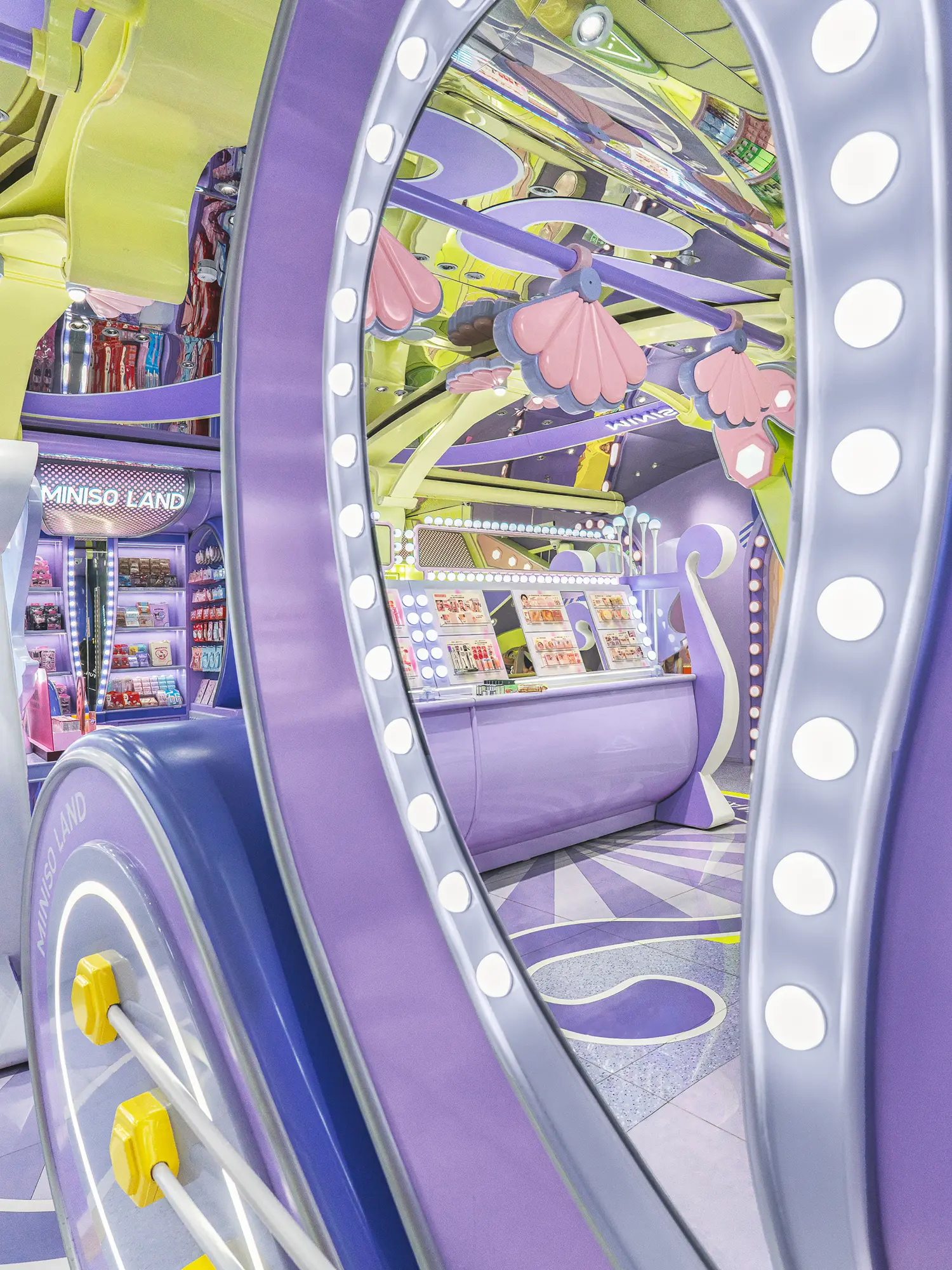 Pastel purple makeup and cosmetic display counter framed by a light-ring archway at MINISO LAND.