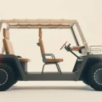 Amble One street-legal electric buggy side profile, aluminum frame, cotton canvas roof, leather seats, 28-inch off-road wheels, studio shot 2026