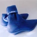 Camper x Issey Miyake Anna boot in blue TENCEL knit, rear view showing folded cuff with woven Issey Miyake logo