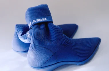Camper x Issey Miyake Anna boot in blue TENCEL knit, rear view showing folded cuff with woven Issey Miyake logo