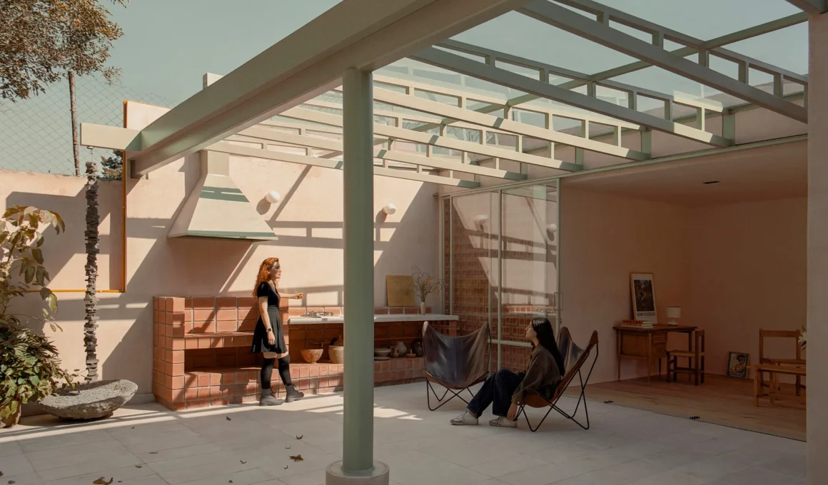 Casa Xoltic AMASA Estudio, rooftop terrace with green steel pergola structure, pink chukum walls, brick outdoor kitchen, Coyoacán Mexico City