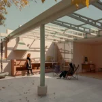Casa Xoltic AMASA Estudio, rooftop terrace with green steel pergola structure, pink chukum walls, brick outdoor kitchen, Coyoacán Mexico City