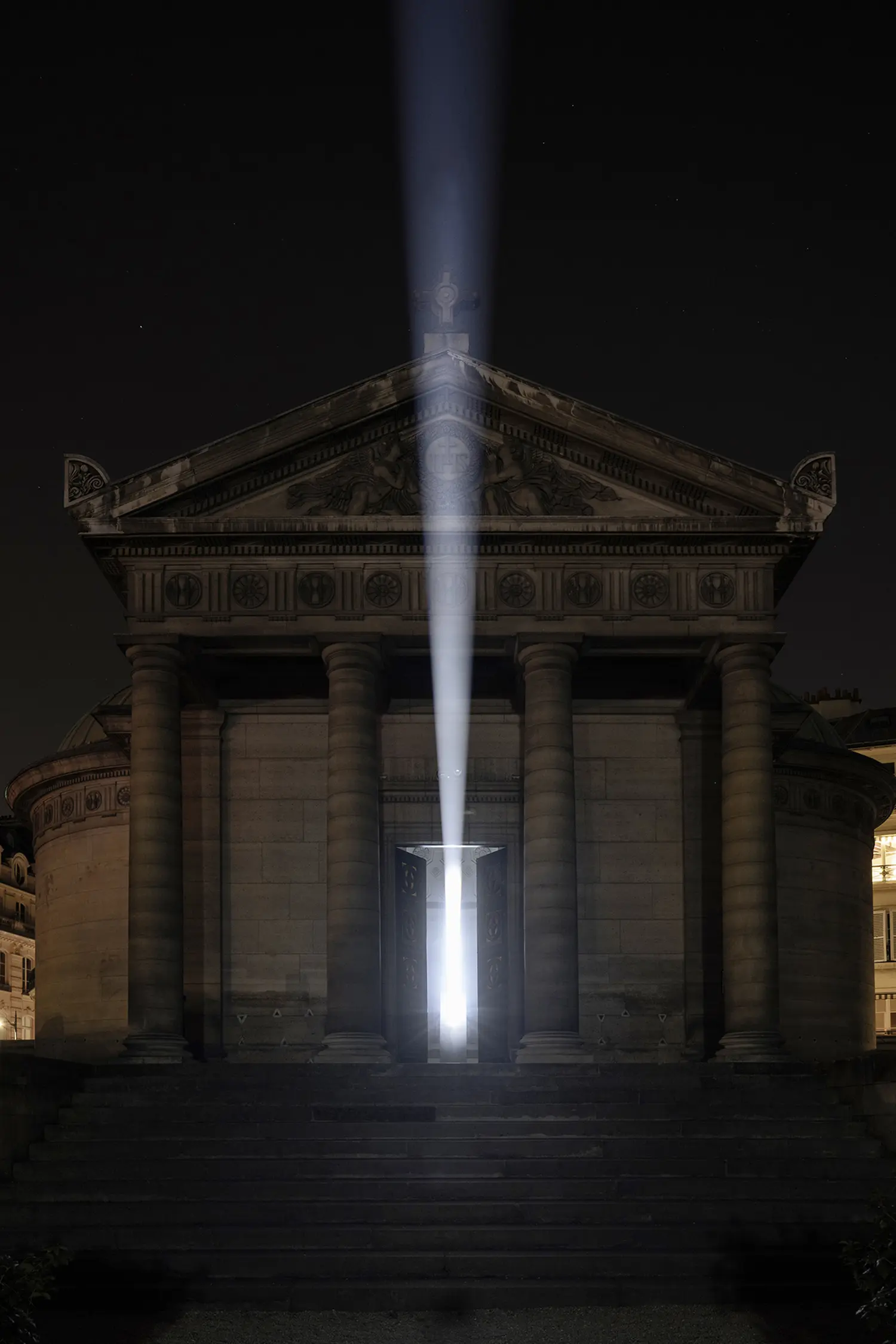 Threshold Emilio Ferro, vertical white light beam rising from Chapelle Expiatoire entrance into night sky, Paris Nuit Blanche 2026