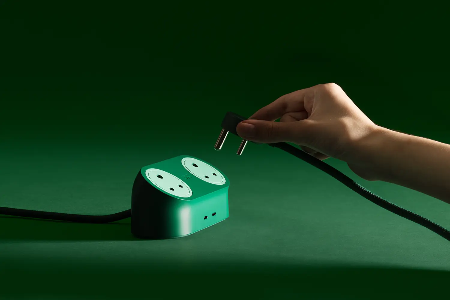 LAYER Daily Objects Loft Forest green charging station close-up plug-in hand braided cord