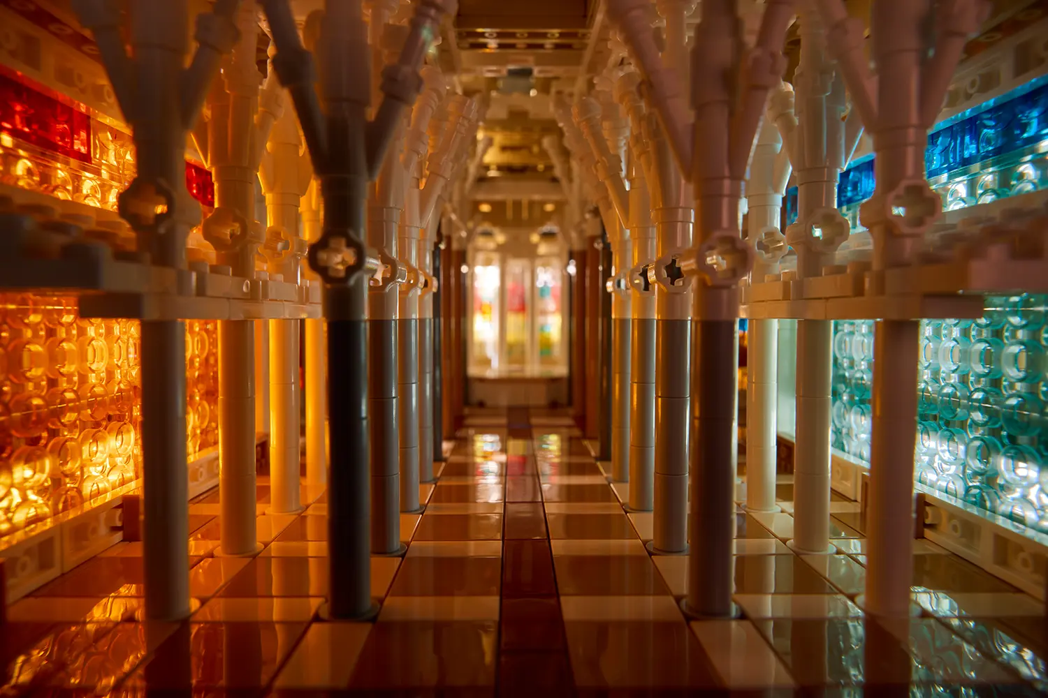 LEGO Architecture Sagrada Família 21065 interior nave view, translucent amber and blue stained glass elements, white columns, tiled floor