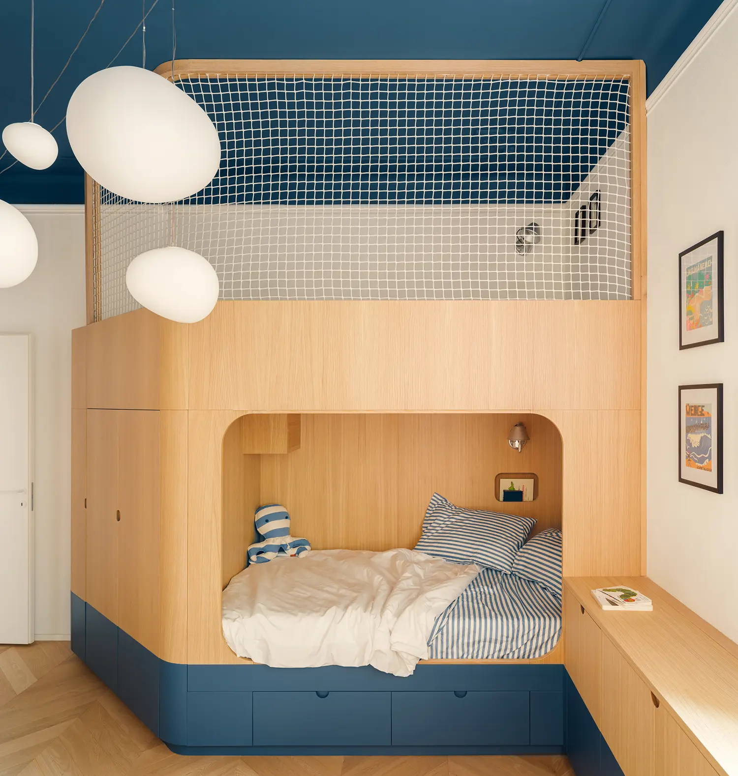 llabb Surf House Levanto children's bedroom custom oak bunk bed sculptural rope net Foscarini Gregg pendants deep blue ceiling