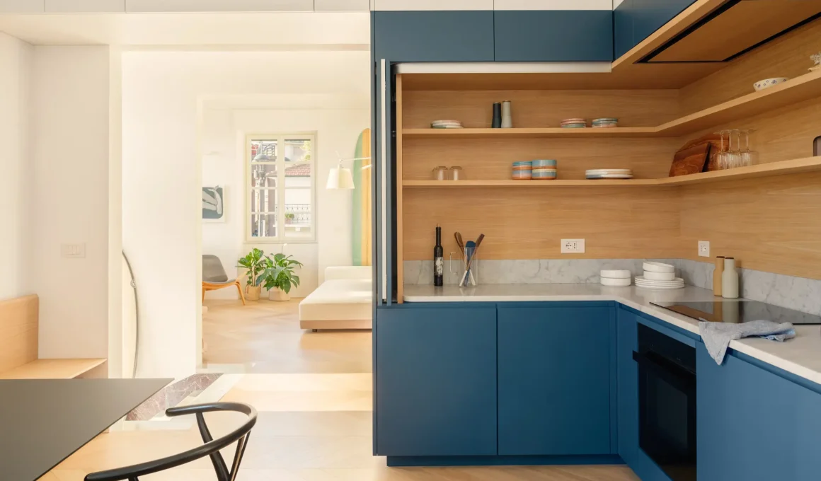 llabb Surf House Levanto kitchen deep blue lacquer oak blockboard shelving marble worktop Carl Hansen CH24 herringbone parquet