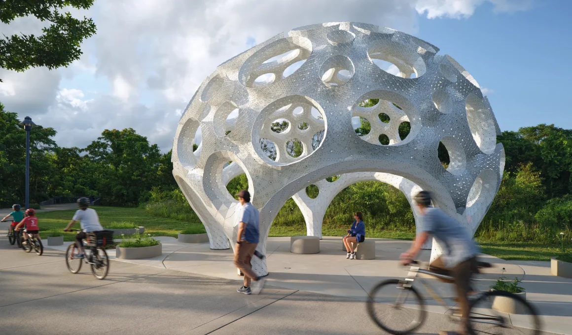 Moonrise Marc Fornes THEVERYMANY, aluminium dome Wheland Foundry Trailhead Chattanooga Tennessee, cyclists and visitors in motion around civic space