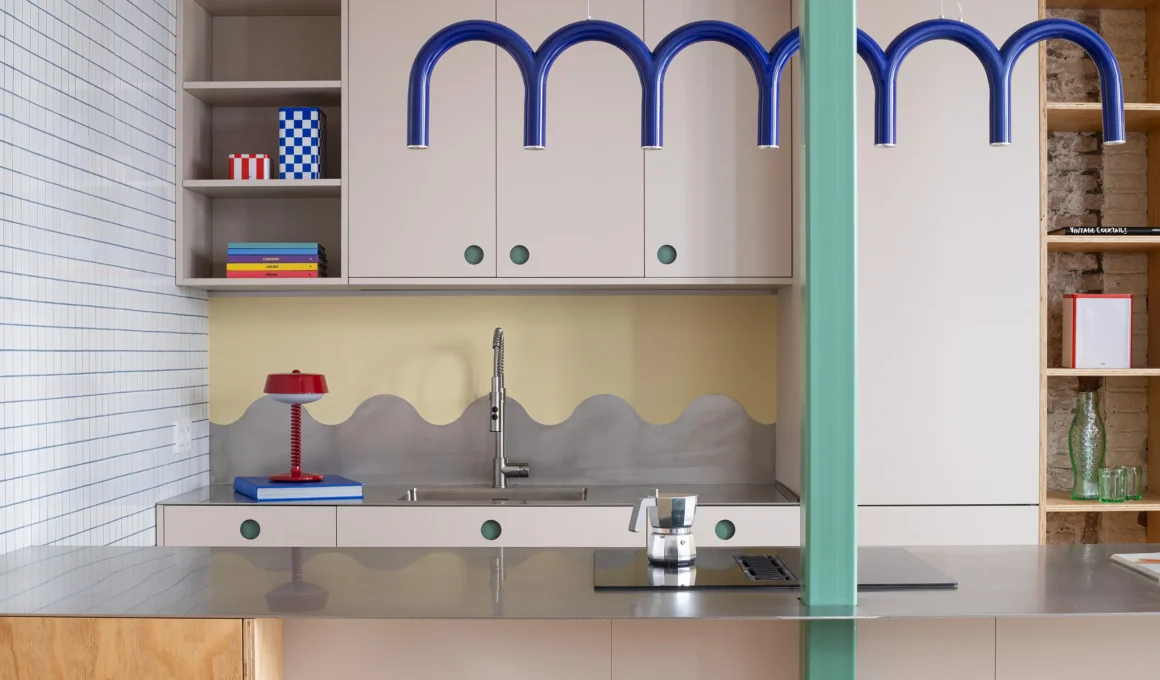 Not a Studio Monterols Barcelona kitchen CUBRO fronts steel countertop WAVES backsplash white mosaic tile green pillar