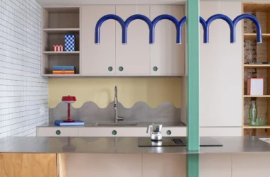 Not a Studio Monterols Barcelona kitchen CUBRO fronts steel countertop WAVES backsplash white mosaic tile green pillar