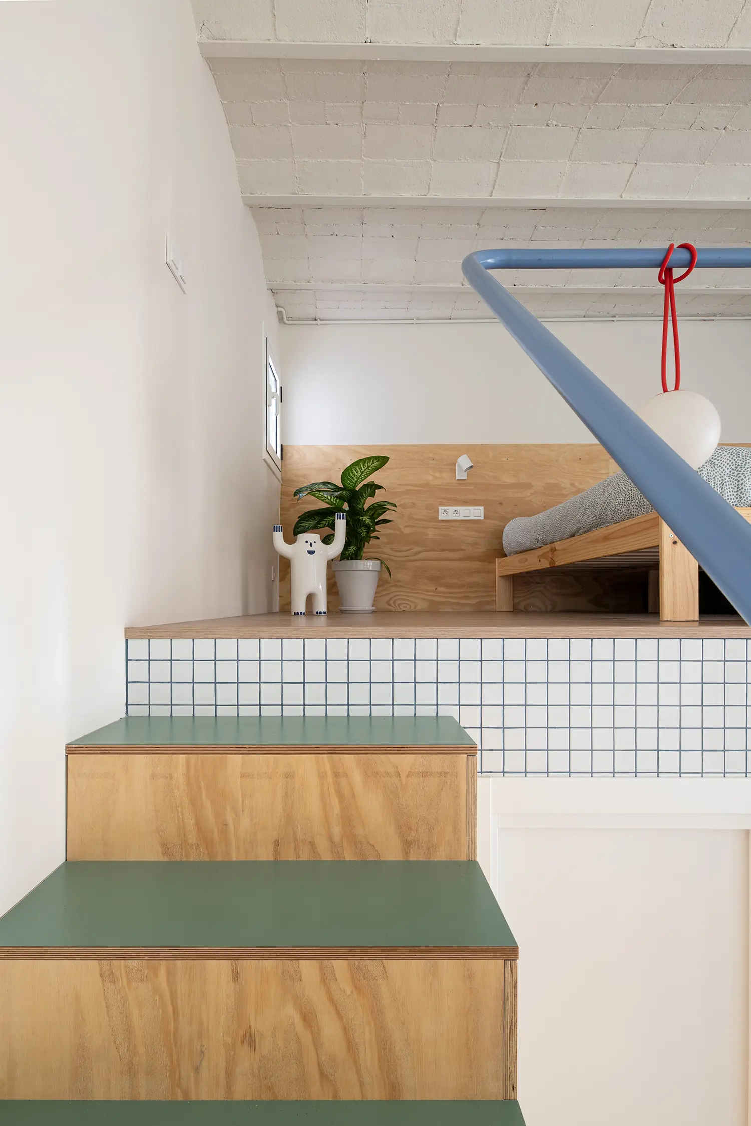Not a Studio Monterols Barcelona mezzanine landing phenolic plywood CE.SI. mosaic tile blue handrail Catalan vault