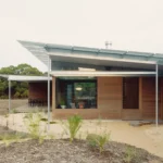 Ironbark House Not All Architecture Victoria galvanized steel ventilated roof ironbark timber cladding modular pavilion coastal landscape