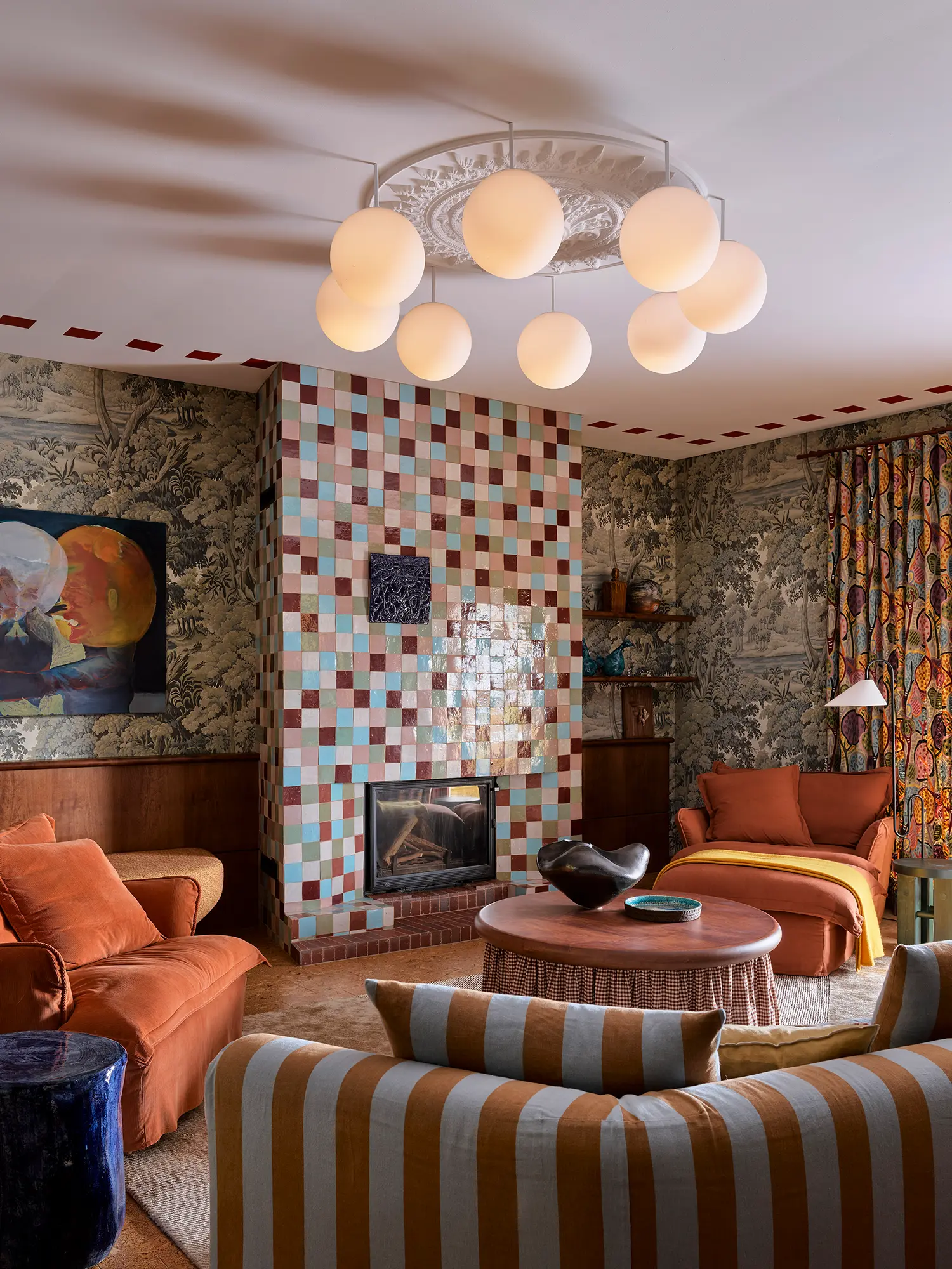 Plantasia YSG Studio New South Wales lounge room patchwork Zellige fireplace pearl globe pendant lighting orange armchairs cork floor