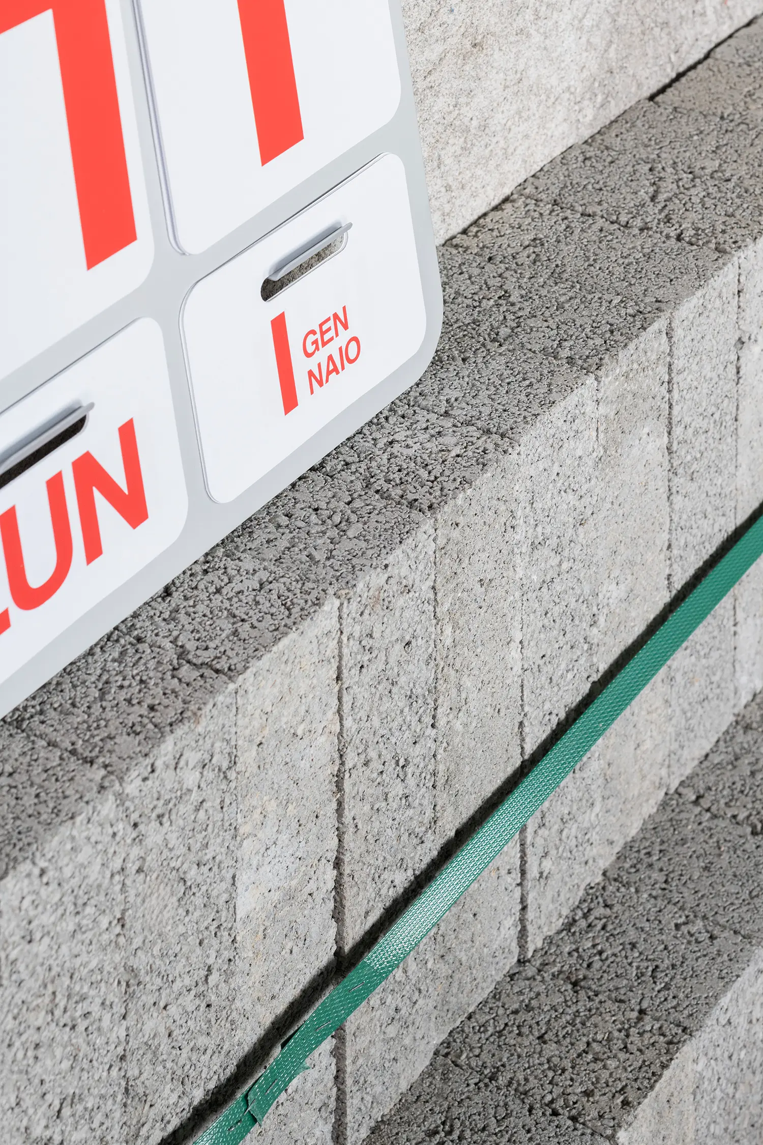 RAW Studio Moroni Architettura Sondrio perforated concrete block surface detail calendar object close-up