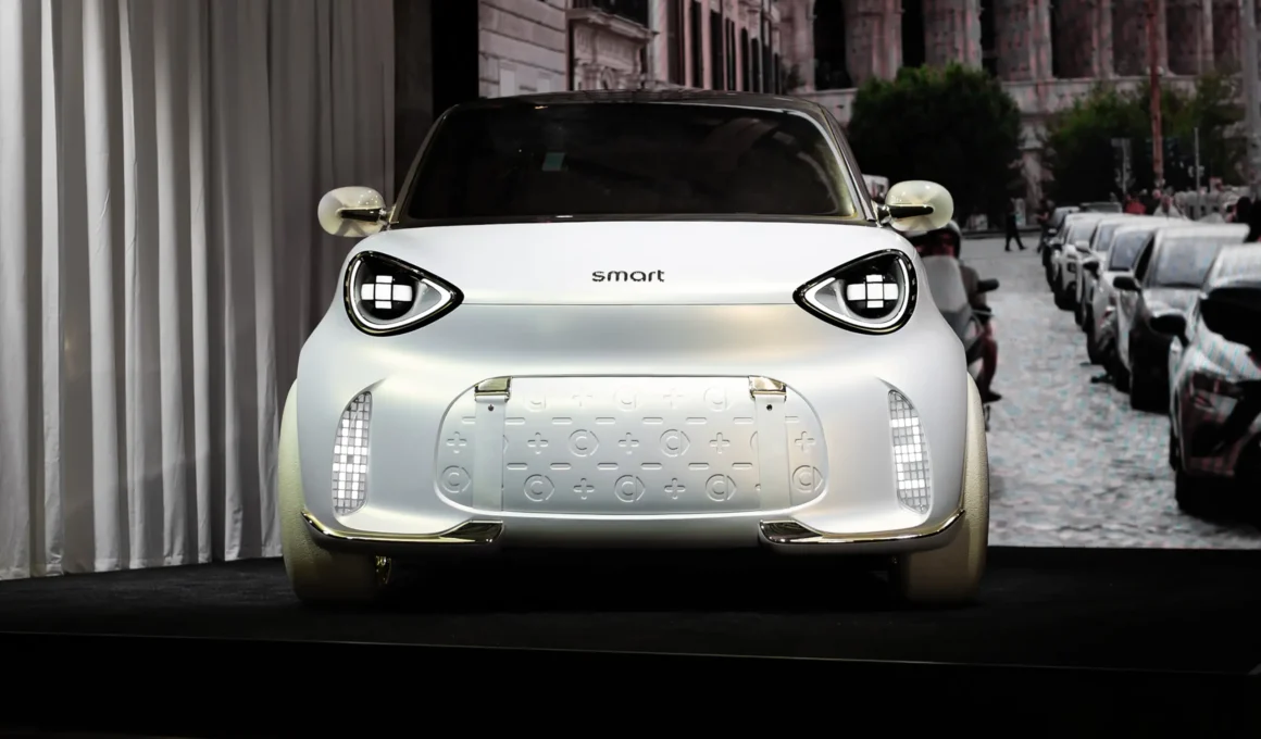 smart Concept #2 exterior front view white body embossed front panel LED headlights Rome projection backdrop