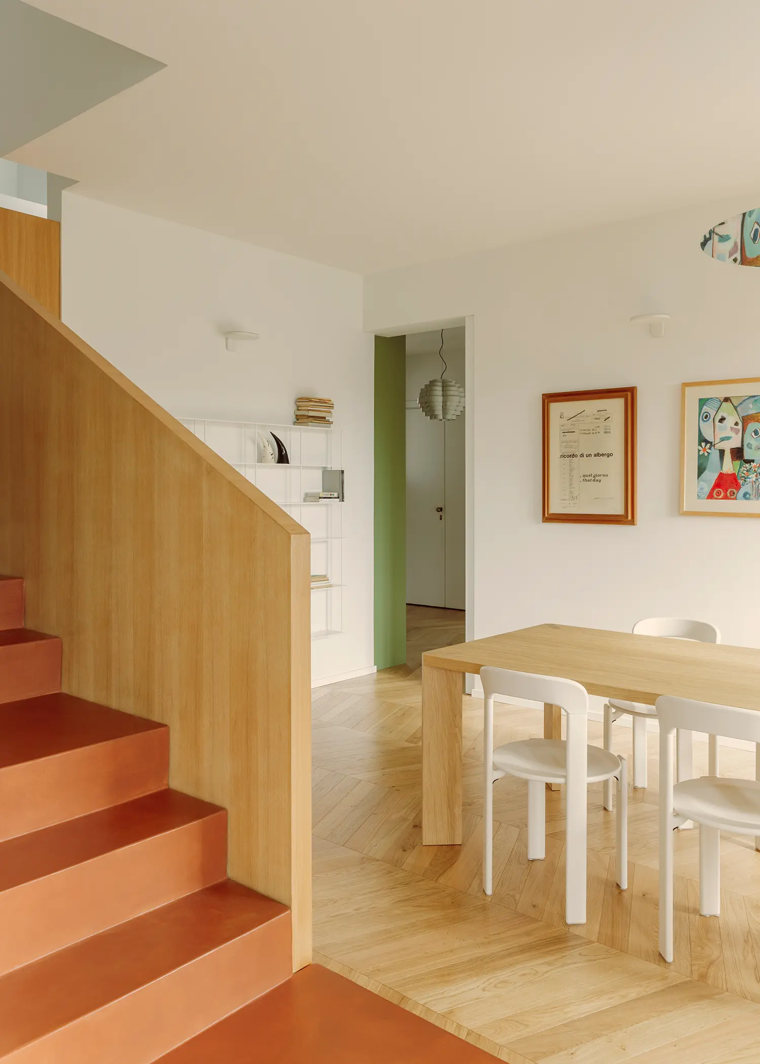 The Lobster bucci quentin, lobster red resin staircase with oak panel surround, herringbone parquet, dining area, Prato 2026