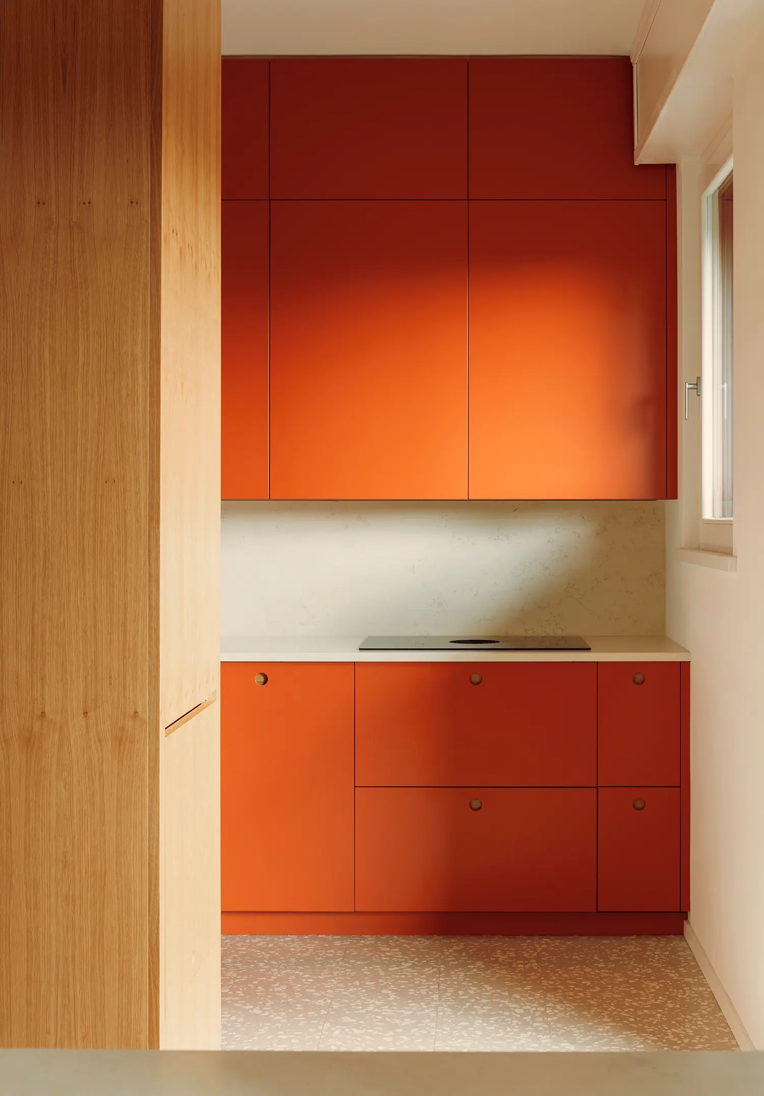 The Lobster bucci quentin, custom-made lobster red lacquered kitchen cabinets with speckled terrazzo floor, Prato Tuscany 2026