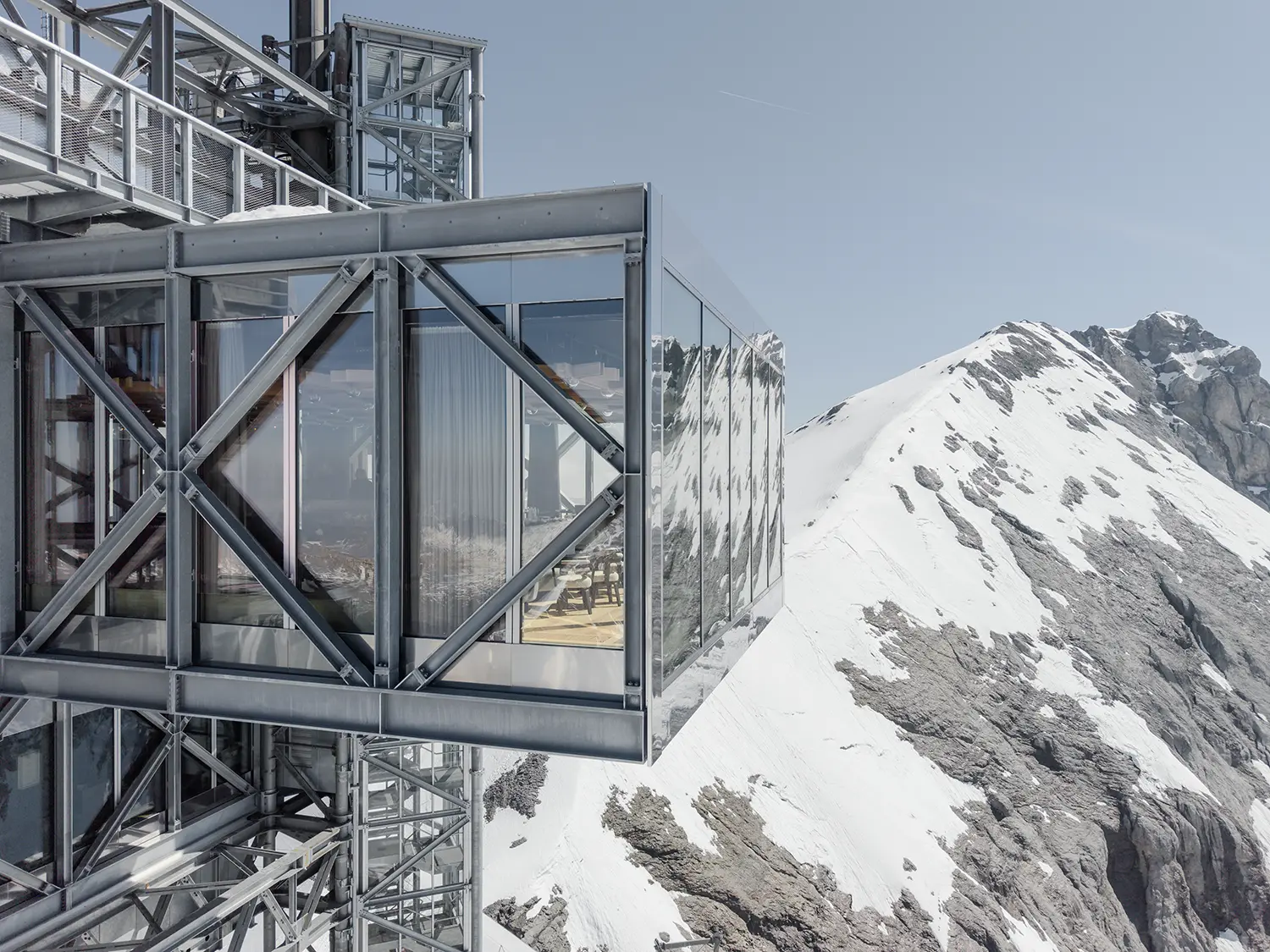 TITLIS Tower Herzog de Meuron glazed cantilevered volume exterior steel X-bracing alpine peak Engelberg Switzerland close detail