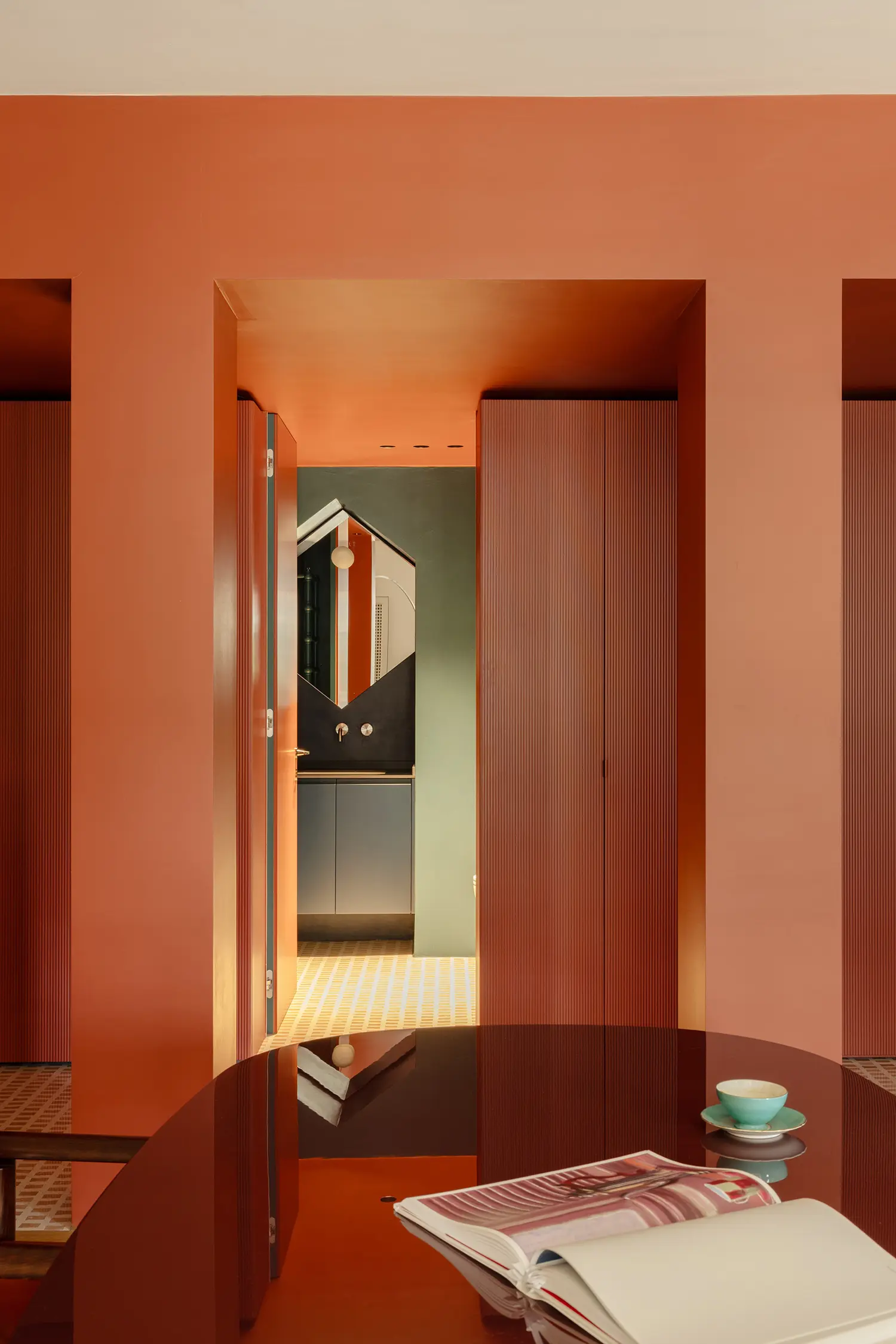 THAT Z SHOW apartment Atelierzero, Milan, corridor sightline into striped bathroom with mirror