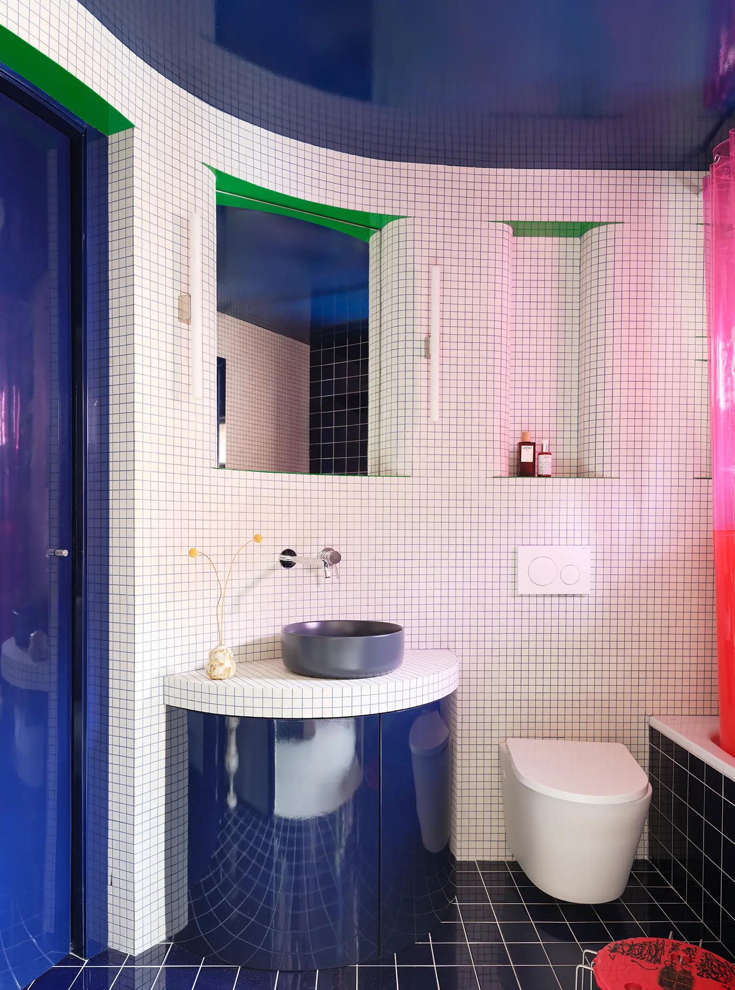Macedonia by Bardo, curved bathroom in white micro-tiling with neon green accents and navy vanity