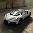 Bugatti W16 Mistral 'Blanc Éternel' roadster, front three-quarter elevated view, white bodywork with black line graphic, industrial warehouse interior