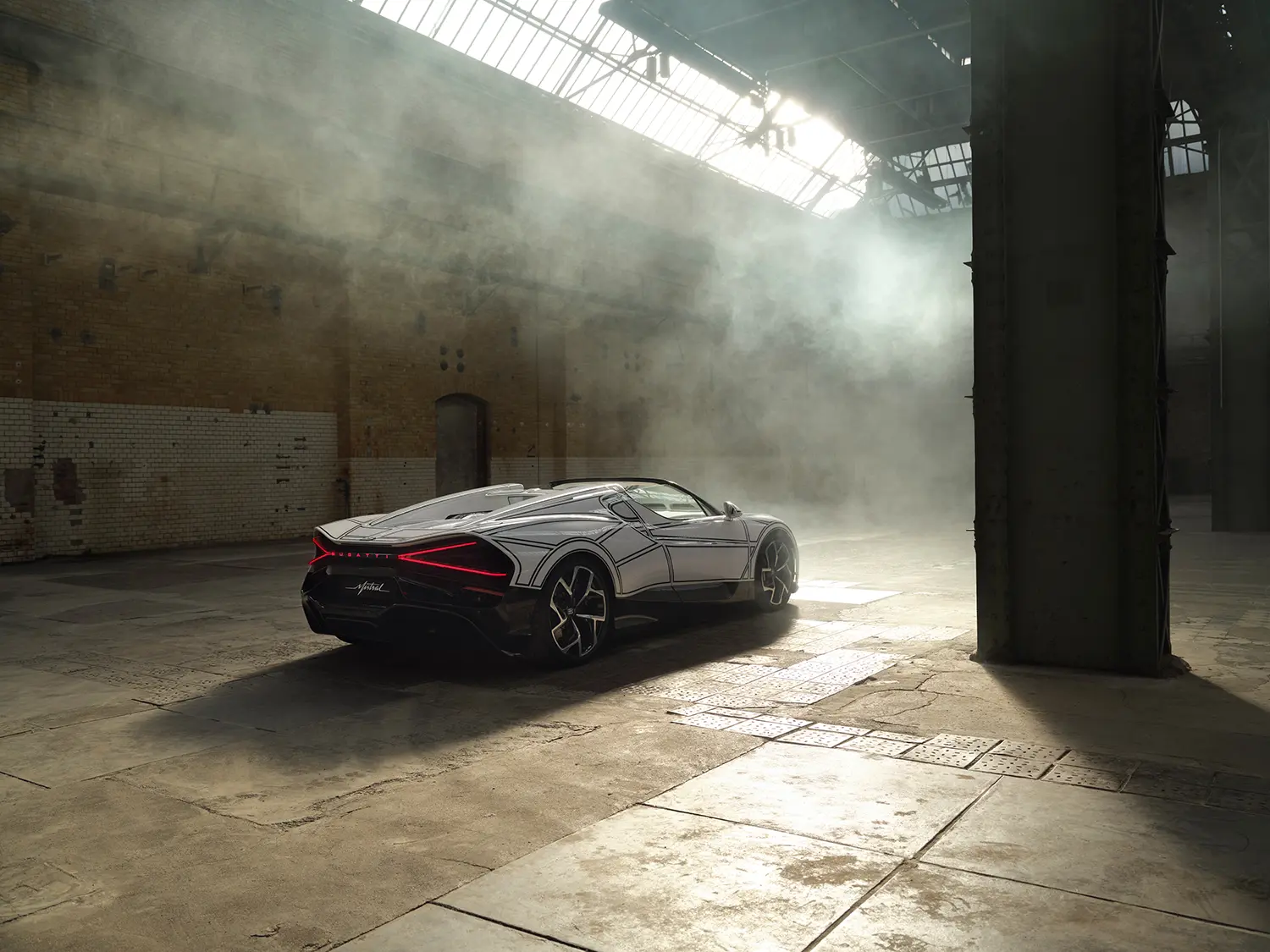 Bugatti W16 Mistral 'Blanc Éternel', rear three-quarter view, small in frame within smoke-filled industrial warehouse, illuminated taillights