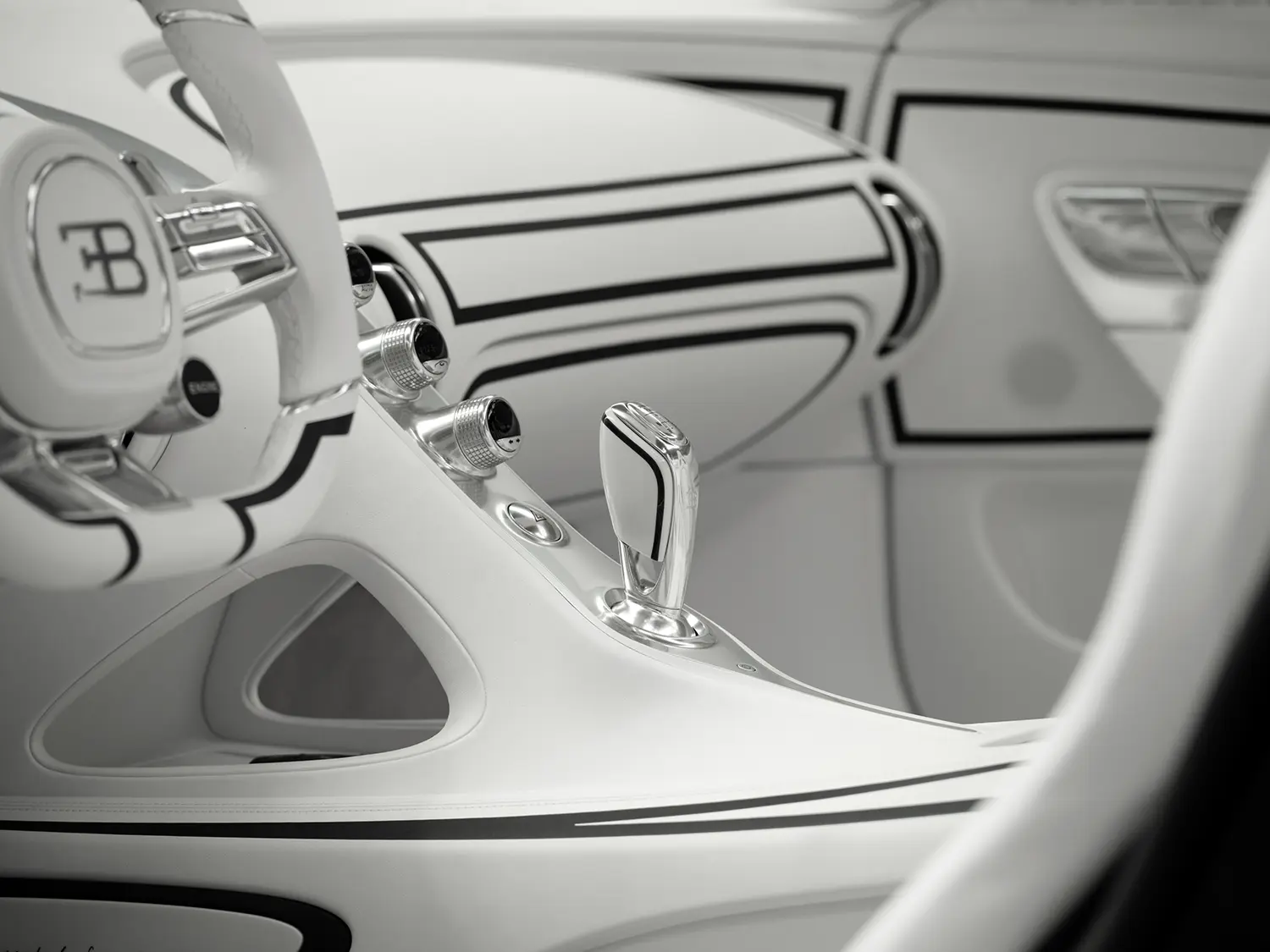 Bugatti W16 Mistral 'Blanc Éternel' interior detail, white leather dashboard with black line graphic, chrome gear shifter, EB steering wheel badge