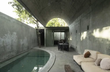 Casa Gruta vaulted concrete dining and lounge area beside plunge pool, Salvador Román & Adela Mortera, Valladolid, Yucatán
