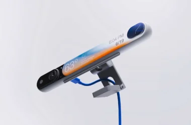 Angled render of IRIS concept webcam showing full illuminated display strip with weather and clock widgets by Connor Grady