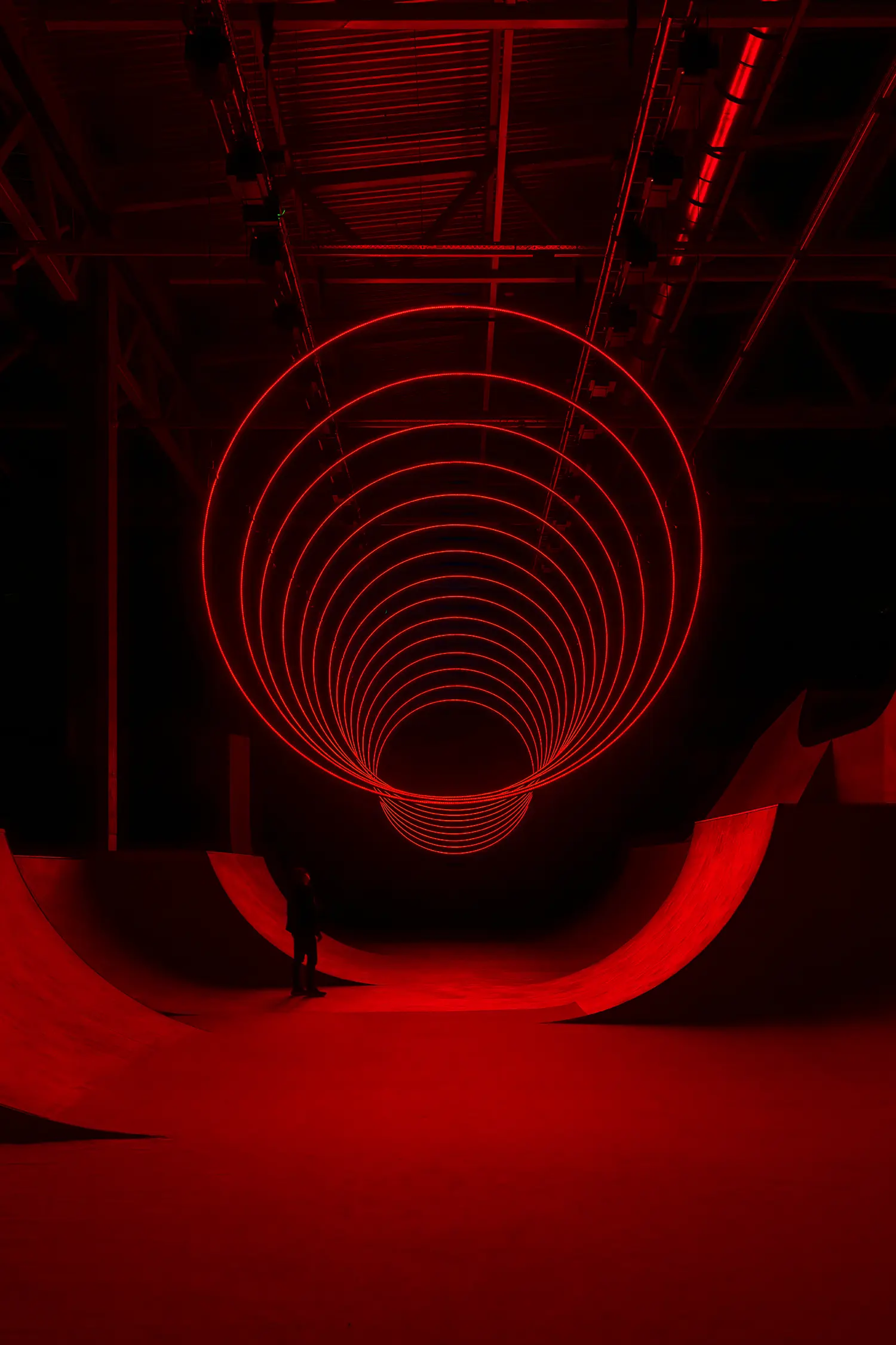 Symmetrical view of SpY's CYCLES N2 concentric rings forming a perfect tunnel above the installation floor