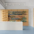 De Cecco Flagship Store by Studio Francesco Faccin, Pescara, wheat sheaf display wall, steel shelving, white stone counter with De Cecco engraving