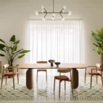 Elia's Home by In-Nova Studio dining area, sage green ceiling, oak table on curved base, geometric terrazzo carpet inlay, Aversa