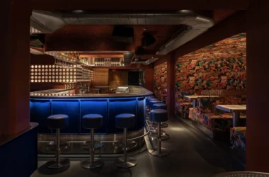 FlipDog basement bar by YOD Group, blue flock counter, WAONE surrealist print upholstery, Shoreditch London