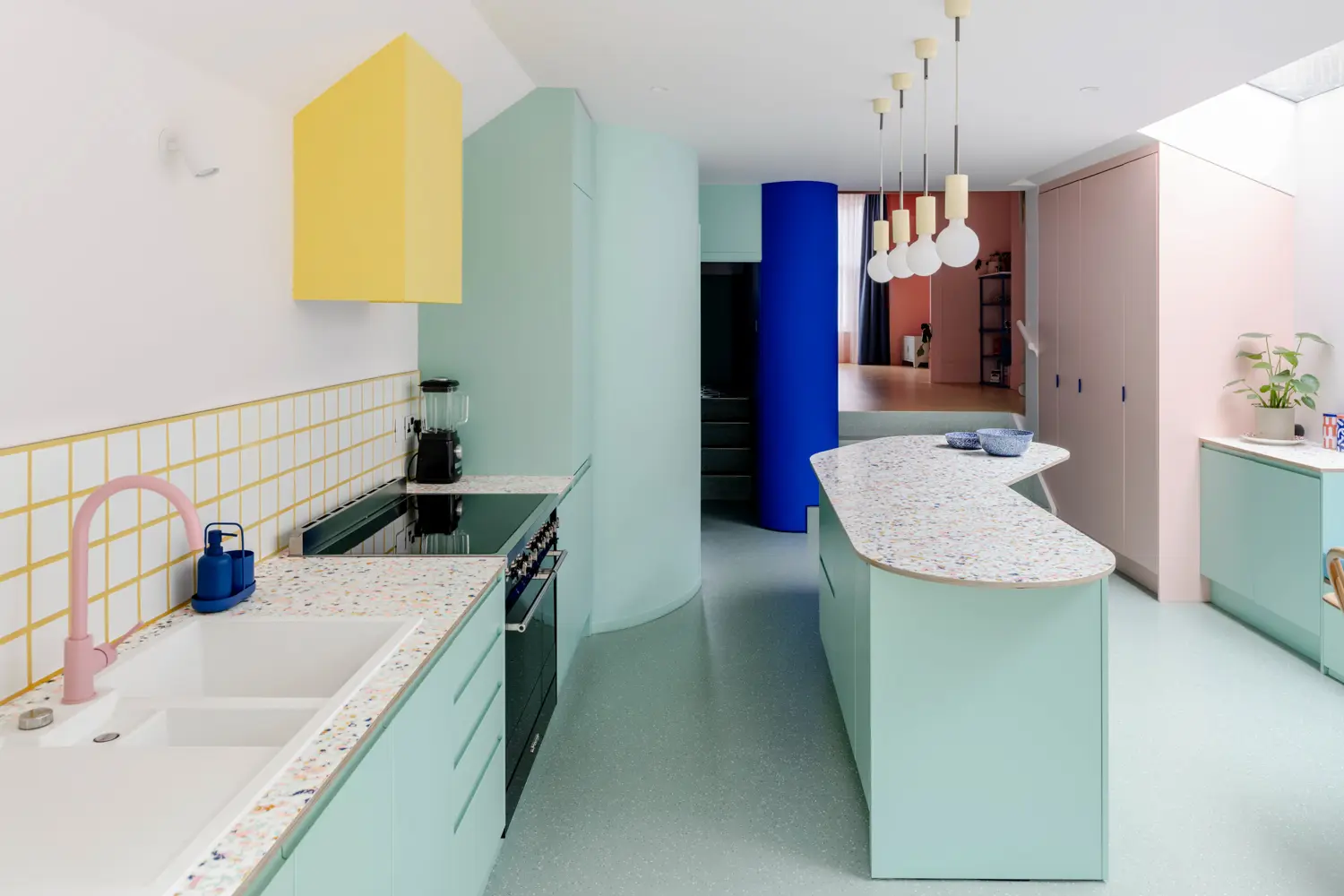 Beacon House kitchen by Office S&M, London — mint green cabinetry, yellow extractor, terrazzo island